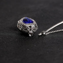 Load image into Gallery viewer, Silver Heart Shaped Cremation Urn Necklace with Rhinestones and Blue Gem