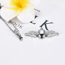 Load image into Gallery viewer, Skull With Wings Cremation Urn Necklace