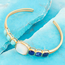 Load image into Gallery viewer, Dual Color Blue Lapis Turquoise and White Mother of Pearl Golden Cuff Bracelet