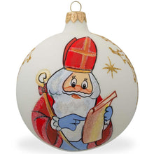 Load image into Gallery viewer, St. Nicholas Reviewing Gift List Glass Ball Christmas Ornament 4 Inches