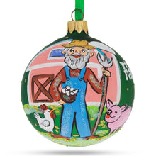 Load image into Gallery viewer, Farmer by the Barn Glass Ball Christmas Ornament 3.25 Inches