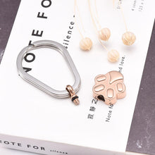 Load image into Gallery viewer, Pet Paw Shaped Cremation Urn Keychain