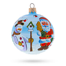 Load image into Gallery viewer, Enchanting Snowman with Bird House and Santa Glass Ball Christmas Ornament 3.25 Inches