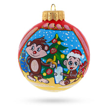 Load image into Gallery viewer, Monkey and Baby by Christmas Tree Glass Ball Christmas Ornament 4 Inches