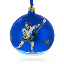 Load image into Gallery viewer, Hockey Player in Action on Blue Glass Ball Christmas Sports Ornament 4 Inches