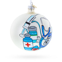 Load image into Gallery viewer, Compassionate Nurse or Doctor on Glass Ball Christmas Ornament 4 Inches