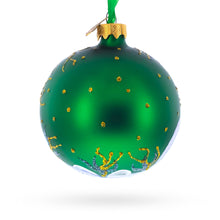 Load image into Gallery viewer, Blue Orchids on Verdant Green Glass Ball Christmas Ornament 3.25 Inches