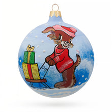 Load image into Gallery viewer, Dog Delivering Christmas Gifts on Sleigh Glass Ball Christmas Ornament 3.25 Inches