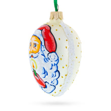Load image into Gallery viewer, Santa Holding Candle Glass Egg Ornament 4 Inches