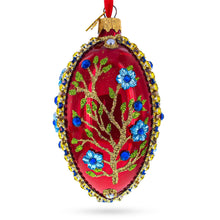 Load image into Gallery viewer, Blue Bejeweled Flowers on Red Glass Egg Ornament 4 Inches