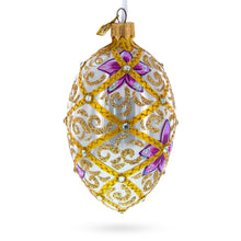 Load image into Gallery viewer, Purple Flowers on Golden Scroll Glass Egg Christmas Ornament 4 Inches