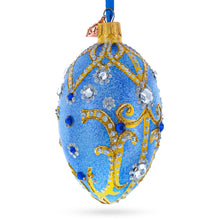 Load image into Gallery viewer, Jewels and Golden Scrolls on Glitter Blue Glass Egg Christmas Ornament 4 Inches