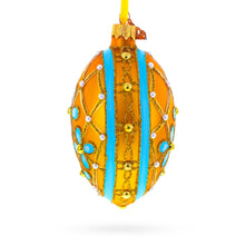 Load image into Gallery viewer, Blue Flowers on Gold Glass Egg Ornament 4 Inches