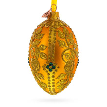 Load image into Gallery viewer, Glittered Golden Leaves Orange Glass Egg Ornament 4 Inches