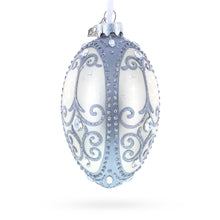 Load image into Gallery viewer, Silver Scrolls on White Glass Egg Ornament 4 Inches