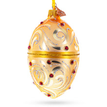 Load image into Gallery viewer, Red Jewels on Champagne Swirls Glass Egg Ornament 4 Inches