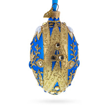 Load image into Gallery viewer, Golden Swirls on Blue Glass Egg Ornament 4 Inches