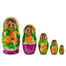 Load image into Gallery viewer, Green Hood with Purple and White Flowers Wooden  Nesting Dolls