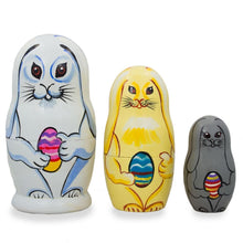 Load image into Gallery viewer, Set of 3 Bunnies with Easter Eggs Wooden Nesting Dolls 4.25 Inches