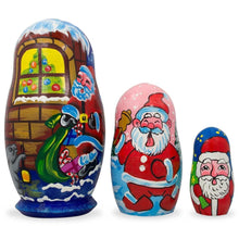 Load image into Gallery viewer, Set of 3 Santa's Delivering Gifts Wooden Nesting Dolls 4.25 Inches