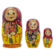 Load image into Gallery viewer, Set of 3 Girls with Flower Bouquet  Nesting Dolls 4.25 Inches