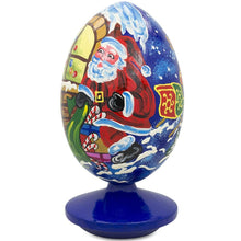 Load image into Gallery viewer, Santa Claus, Bunny Reindeer Looking at the Christmas Tree Wooden Egg 4.75 Inch