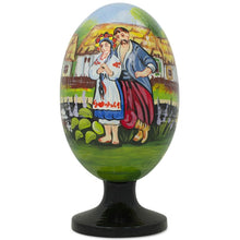 Load image into Gallery viewer, Ukrainian Couple in the Village Wooden Easter Egg Figurine 4.75 Inches