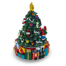 Load image into Gallery viewer, Spinning Base Musical Figurine with Children Decorating Christmas Tree