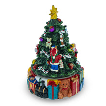 Load image into Gallery viewer, Spinning Base Musical Figurine with Children Decorating Christmas Tree