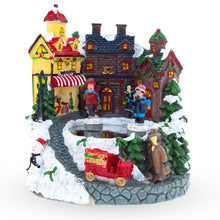 Load image into Gallery viewer, Winter Village Skating Animated Musical Christmas Figurine