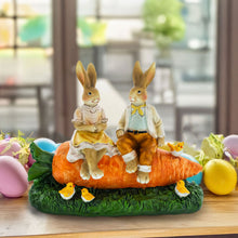 Load image into Gallery viewer, Bunny Couple in Love Sitting on a Carrot Figurine