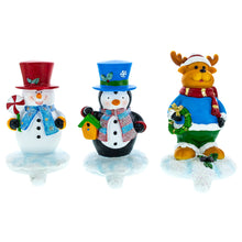 Load image into Gallery viewer, Set of 3 Holiday Stocking Holders Hangers – Snowman, Penguin, and Reindeer Christmas Mantel Decor
